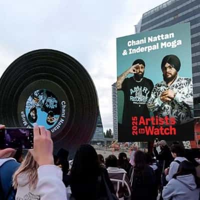 Vinyl Record Rolling on the Street in a fake-out-of-home ad of Amazon Music