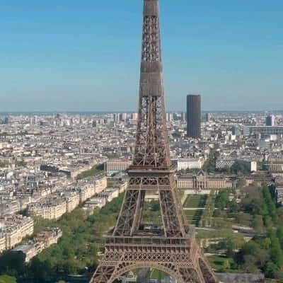 Purple Fuzzy Inflatables Bumps onto Eiffel Tower in a fake-out-of-home-ad of Vivo