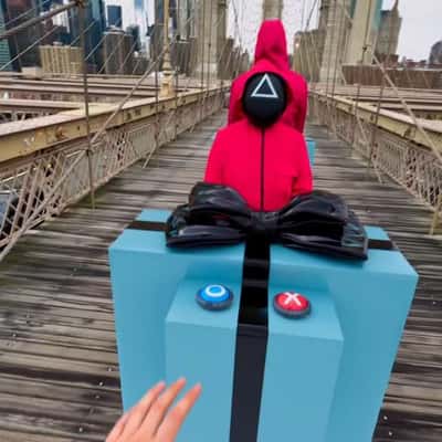 Player Falls From the Bridge in a fake-out-of-home ad of Squid Game