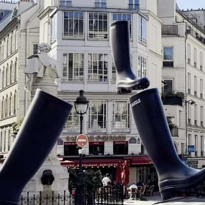 Black Boots Rain Down on the Street in a fake-out-of-home ad of Aigle