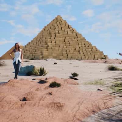 Coffee Pack Drops Near Pyramid in a fake-out-of-home ad of Bieder & Maier