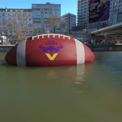 Football Floating on Canal in a fake-out-of-home ad of Vienna Vikings