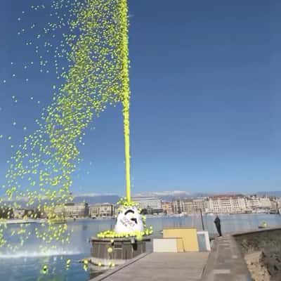 Water Jet Releases Tennis Balls in a fake-out-of-home ad of Gonet Geneva Open