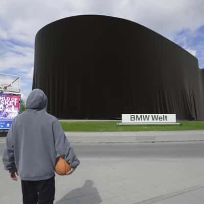 Arena Unveiled by Black Cloth in a fake-out-of-home ad of BMW