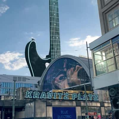 Electric Guitar TV Tower in a fake-out-of-home ad of Lenny Kravitz