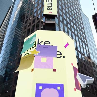 Mouse Pointer Pasted Ad on Digital Screen in a fake-out-of-home ad of Figma