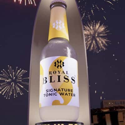 Tower Unfurls Revealing Tonic Water in a fake-out-of-home ad of Royal Bliss