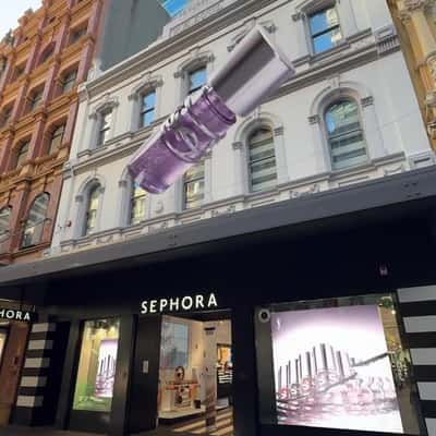 Lip Gloss Transforms Façade in a fake-out-of-home ad of Sephora