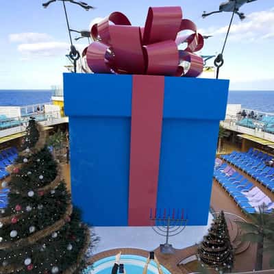 Sandcastle Unboxing at Ship in a fake-out-of-home ad of Carnival Cruise