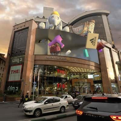 Shopping Goods Emerge from Screen in a fake-out-of-home ad of Palladium