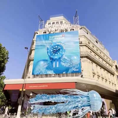 Jelly Fish Swims Above Street in a fake-out-of-home ad of Galeries Lafayette 