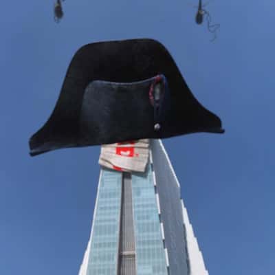 Helicopters Drop Hat on Tower in a fake-out-of-home ad of Sony Pictures