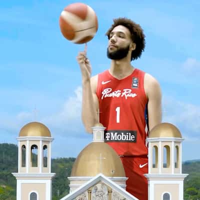 Giant Players Tossing Basketball in a fake-out-of-home ad of T-Mobile