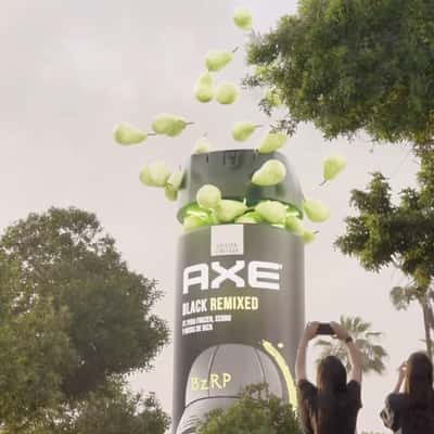 Perfume Spray Bottle Releases Pears in a fake-out-of-home ad of AXE