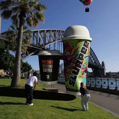 Inflated Cups Take Off Near the Bridge in a fake-out-of-home ad of 7-Eleven