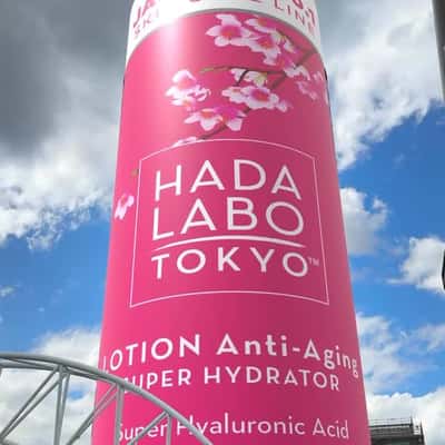 Tower Transformed into Lotion Bottle in a fake-out-of-home ad of Hada Labo Tokyo