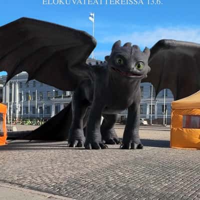 Dragon Lands Near the Street in a fake-out-of-home ad of Leffamaailma