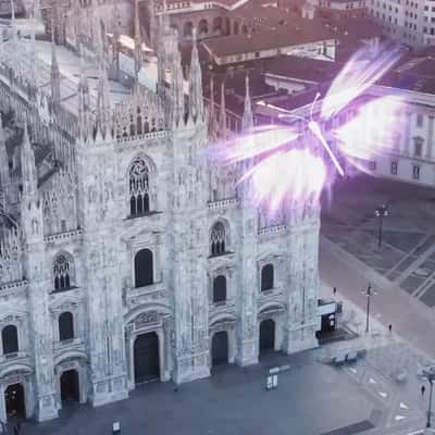 Glowing Butterfly Emerges from Smartphone in a fake-out-of-home ad of OPPO