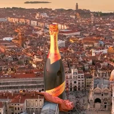 Bell Tower Transformed into Wine Bottle in a fake-out-of-home ad of Mionetto