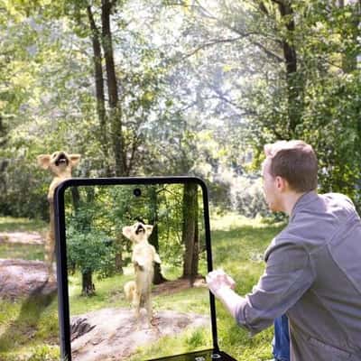 Phone Transformed into Window in a fake-out-of-home ad of Samsung Galaxy