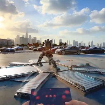 Robot Emerges from Metal Box in a fake-out-of-home ad of Samsung