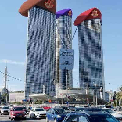 Towers Wearing Military Hands in a fake-out-of-home ad of Azrieli