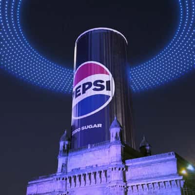 Can Inflates at Gateway to India in a fake-out-of-home ad of Pepsi