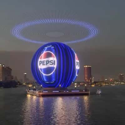 Sphere Digital Screen Display on the River in a fake-out-of-home ad of Pepsi