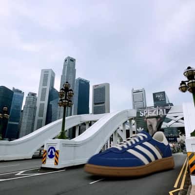 Sneakers Flying in Singapore in a fake-out-of-home ad of Adidas