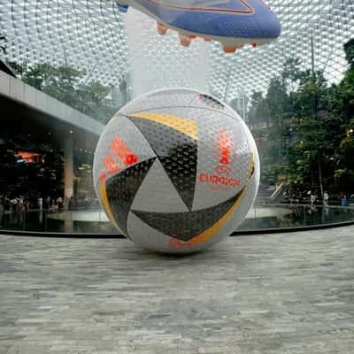 Soccer Ball Burst Out of Digital Screen in a fake-out-of-home ad of Adidas