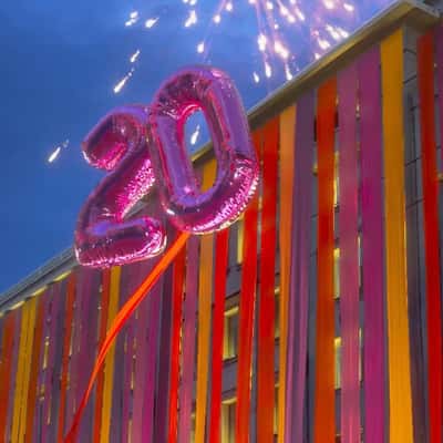 Number Balloons Rise from Mall Facade in a fake-out-of-home ad of Attica