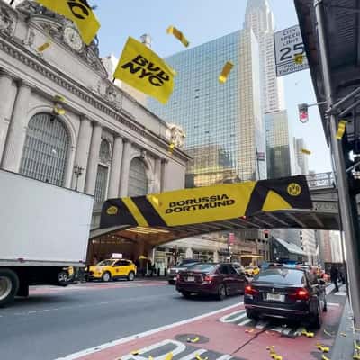 Yellow Confetti Rains in New York in a fake-out-of-home ad of Borussia Dortmund