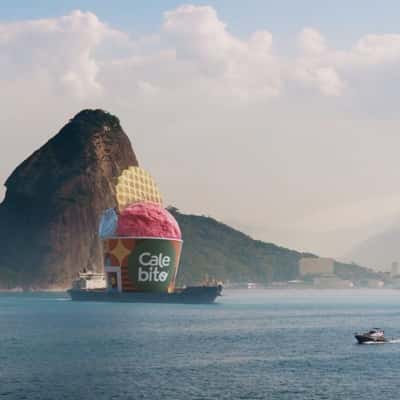 Ice Cream Transported by Cargo Ship in a fake-out-of-home ad of Calebito Macaé