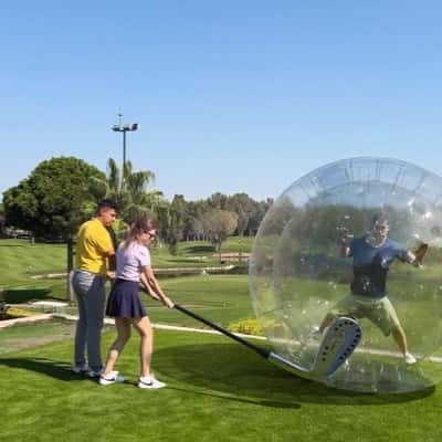 Man in Ball Tossed onto Field in a fake-out-of-home ad of Carya Golf Club