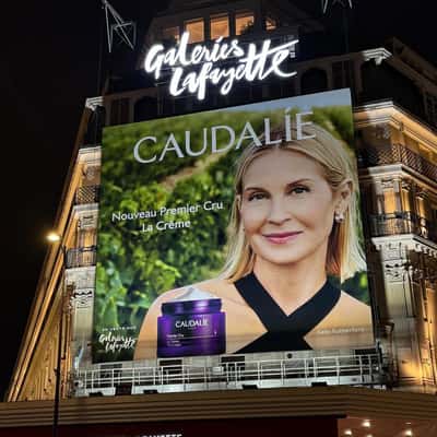 Shopping Center Glows in Purple in a fake-out-of-home ad of Caudalie