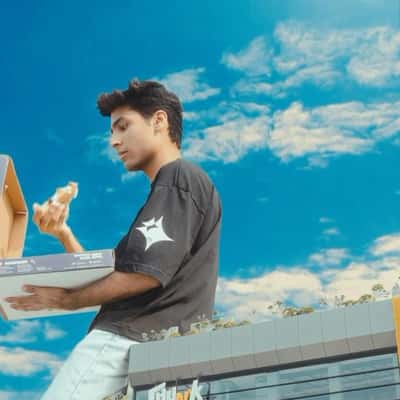 Pizza Box Lands on Rooftop in a fake-out-of-home ad of Chunk N Cheese