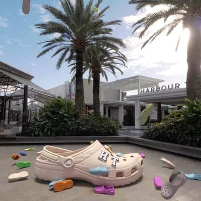 Clogs Rain Down at Shopping Center in a fake-out-of-home ad of Clogs