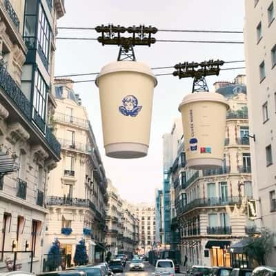 Coffee Cup Cable Cars in a fake-out-of-home ad of Cuvée Noire