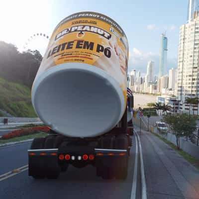 Containers Transported by Trucks in a fake-out-of-home ad of DR. PEANUT