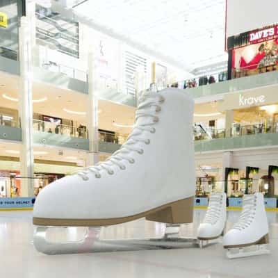 Ice Skates Glide on Rink in a fake-out-of-home ad of Dubai Mall