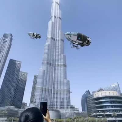 Airships Operated by Bicyclist in a fake-out-of-home ad of Dubai Tourism Company