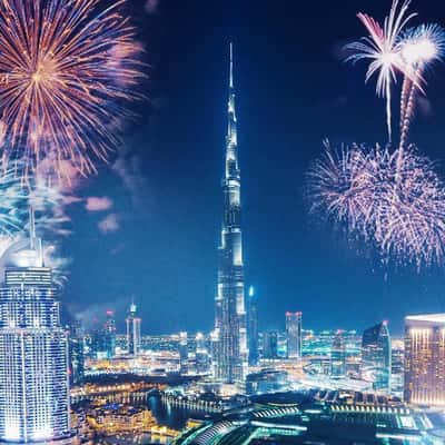 Cards Tumble like Dominoes in a fake-out-of-home ad of Emirates NBD