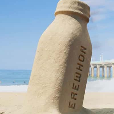 Bottle Sand Sculpture in a fake-out-of-home ad of Erewhon