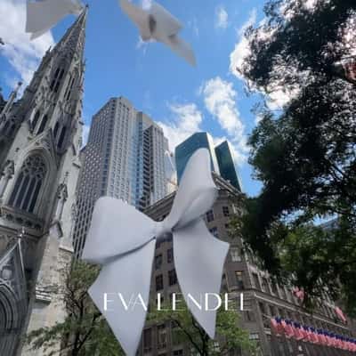 Butterfly Bows Perched on Buildings in a fake-out-of-home ad of Eva Lendel