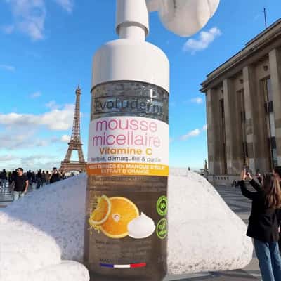 Cleanser Bottle Releases Foam in a fake-out-of-home ad of Evoluderm
