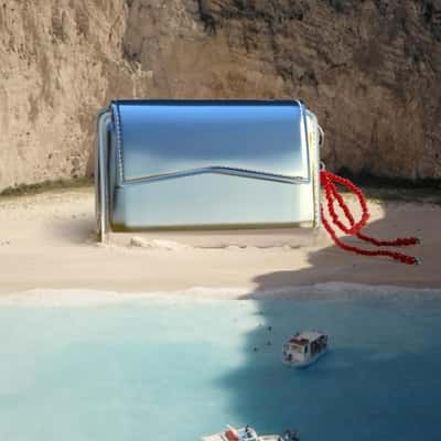 Card Case Installation on the Beach in a fake-out-of-home ad of Fennec