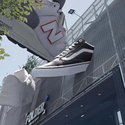 Shoes Installation on Store Facade in.a fake-out-of-home ad of Folder