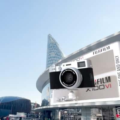 Camera Captures Shot from Facade in a fake-out-of-home ad of Fujifilm