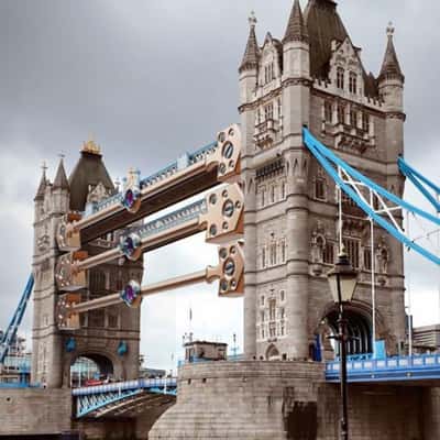 Watch Components on Bridge in a fake-out-of-home ad of Girard-Perregaux