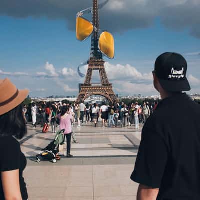 Sunglasses Spiraling at Eiffel Tower in a fake-out-of-home ad of Glorify Unbreakable
